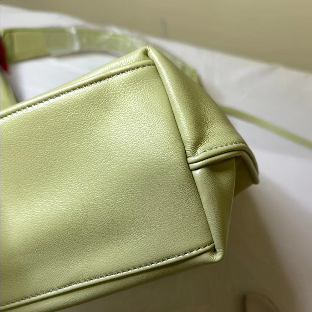 Green‎ Hobo Bag with Minimalist Design and Relaxed Silhouette